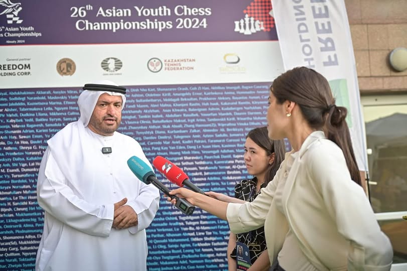 Event photo with H.E. Hisham Al Taher