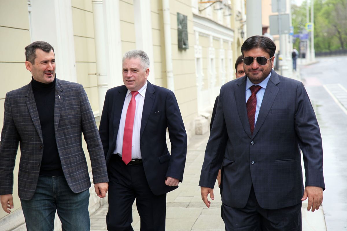 Leadership and networking scene with H.E. Hisham Al Taher